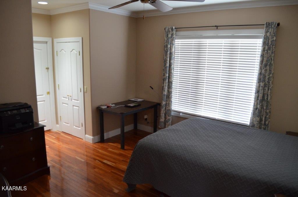 13 Hampton Point Crossville, TN 38558 - Photo 21 of 45 a bedroom with a bed and a window