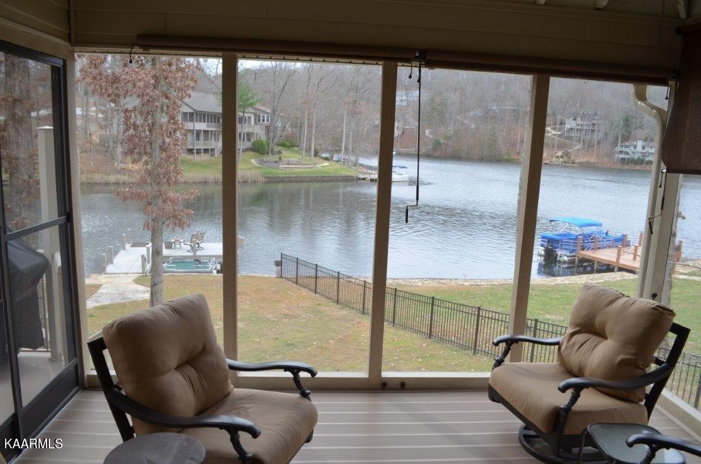 13 Hampton Point Crossville, TN 38558 - Photo 3 of 45 a living room with furniture and a floor to ceiling window