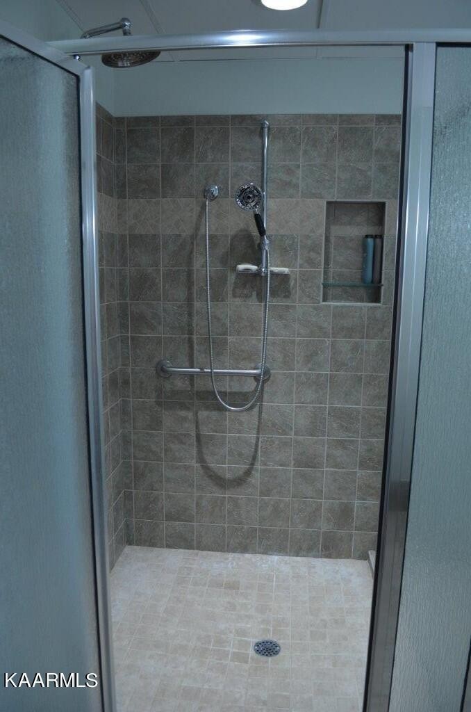 13 Hampton Point Crossville, TN 38558 - Photo 34 of 45 a bathroom with a shower