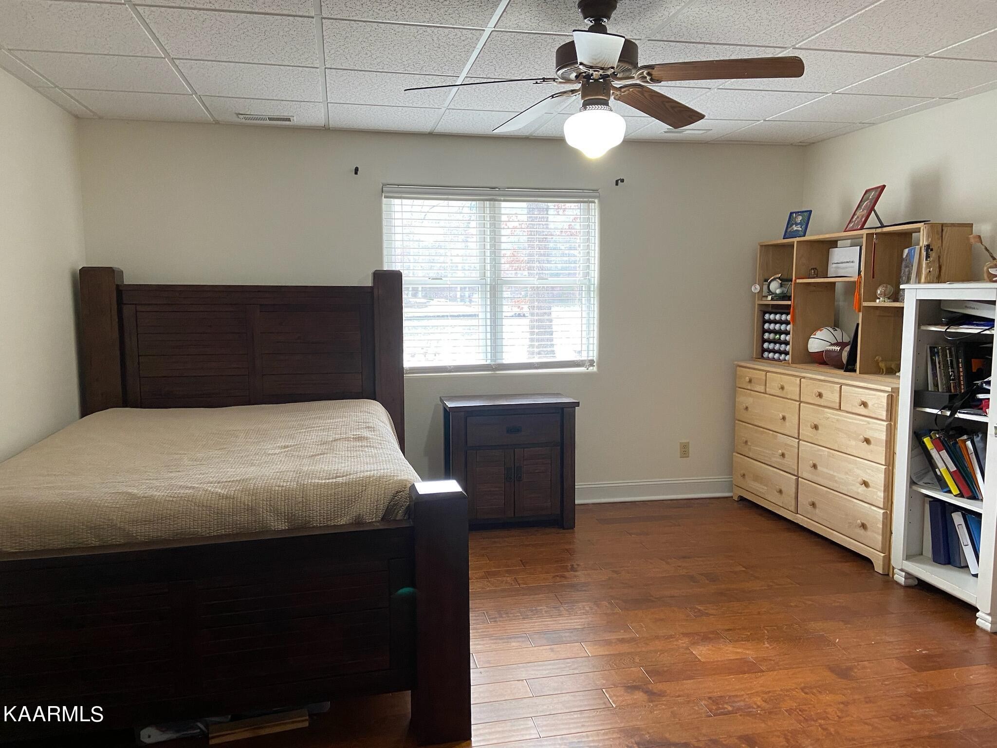 13 Hampton Point Crossville, TN 38558 - Photo 35 of 45 a bedroom with a bed closet and a window