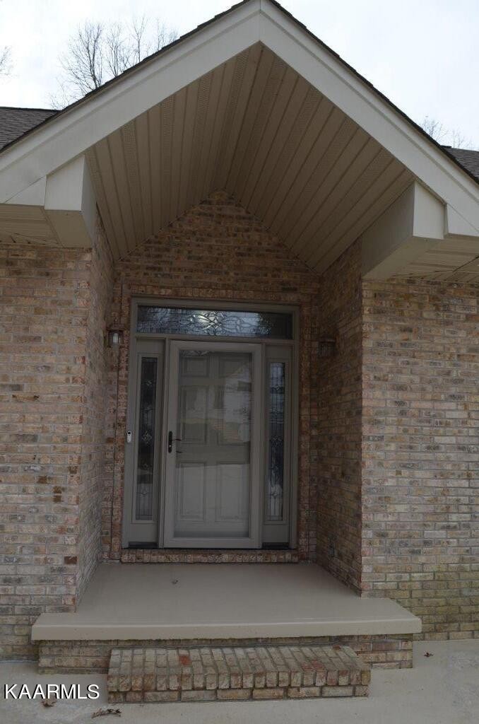 13 Hampton Point Crossville, TN 38558 - Photo 42 of 45 a front view of a house with a glass door