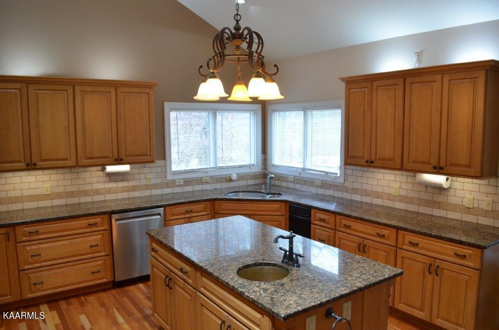 13 Hampton Point Crossville, TN 38558 - Photo 7 of 45 a kitchen with a sink a window and cabinets