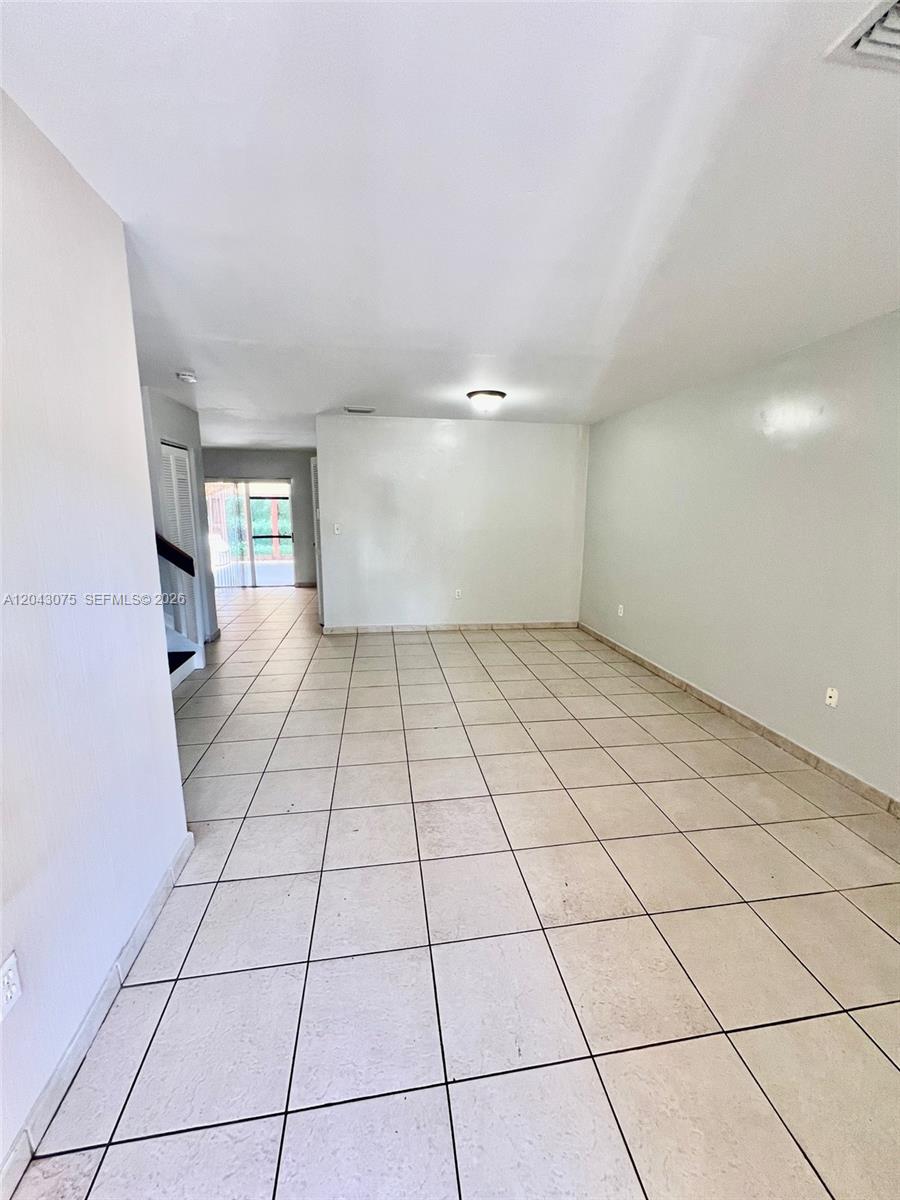 6975 Northwest 173rd Drive, Unit 2007 Hialeah, FL 33015 - Photo 2 of 14 living and dining