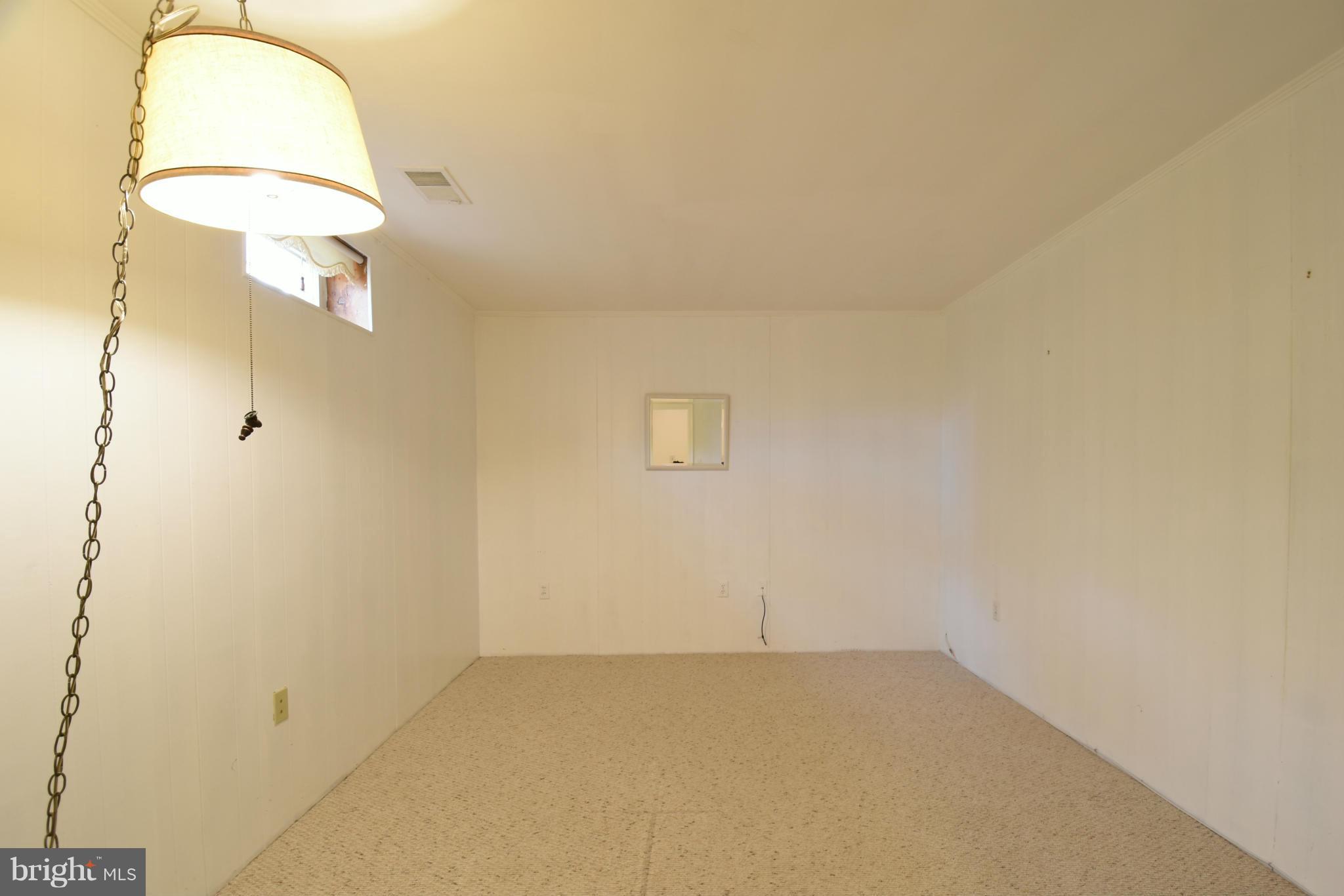 7033 Leestone Street Springfield, VA 22151 - Photo 21 of 25 LOWER LEVEL DEN /OFFICE