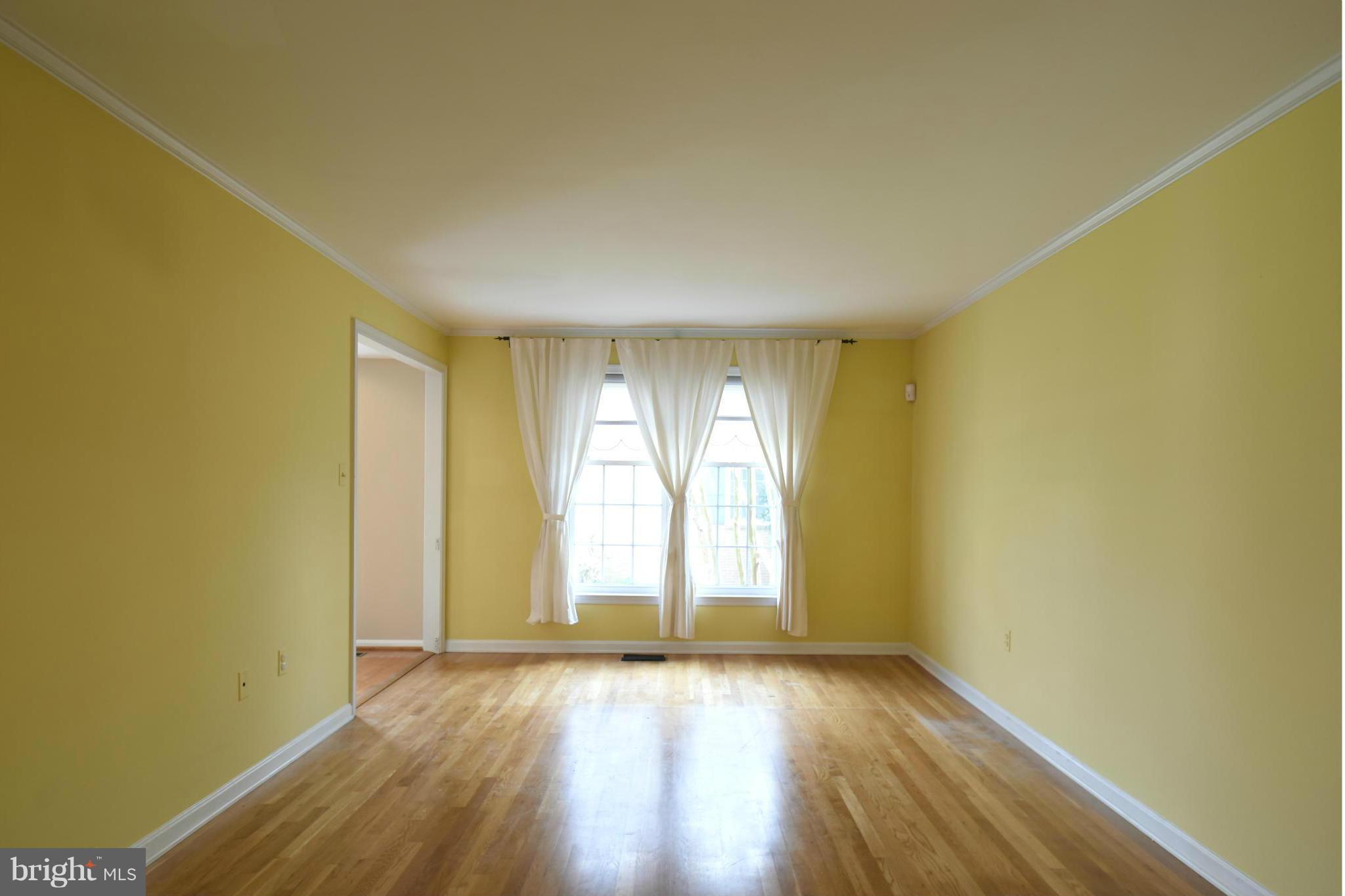 7033 Leestone Street Springfield, VA 22151 - Photo 5 of 25 LIVING ROOM WITH HARDWOOD FLOOR