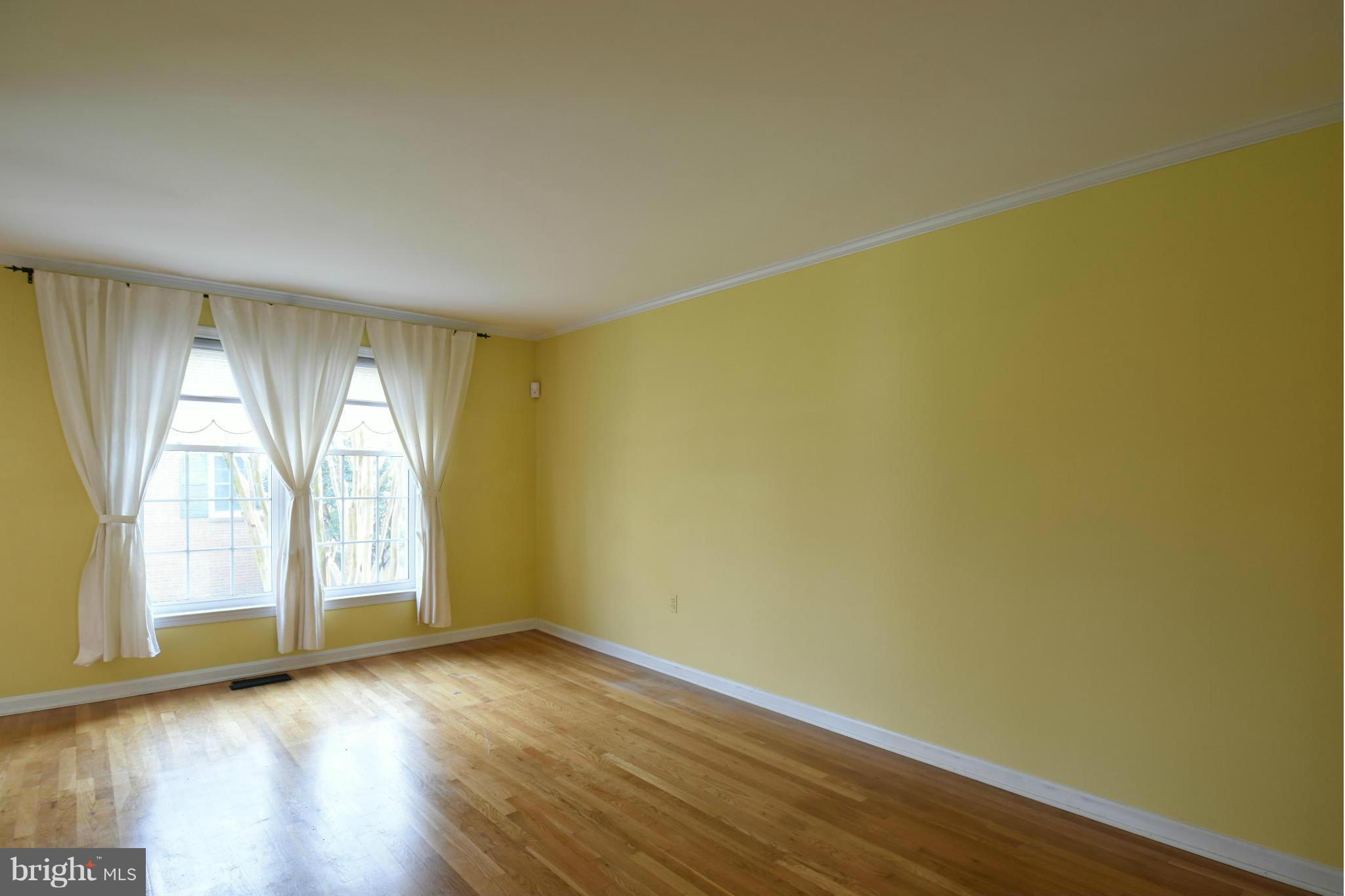 7033 Leestone Street Springfield, VA 22151 - Photo 6 of 25 LIVING ROOM WITH HARDWOOD FLOOR