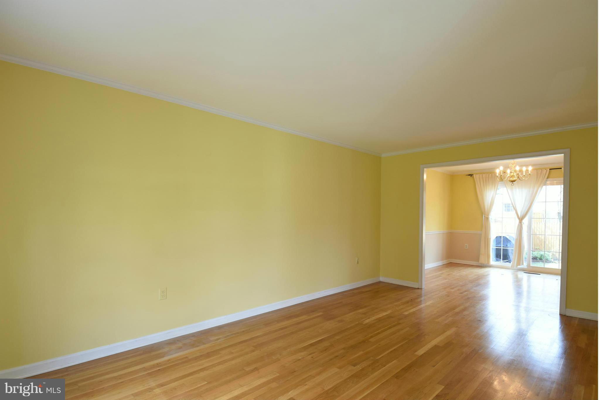 7033 Leestone Street Springfield, VA 22151 - Photo 7 of 25 LIVING ROOM WITH HARDWOOD FLOOR
