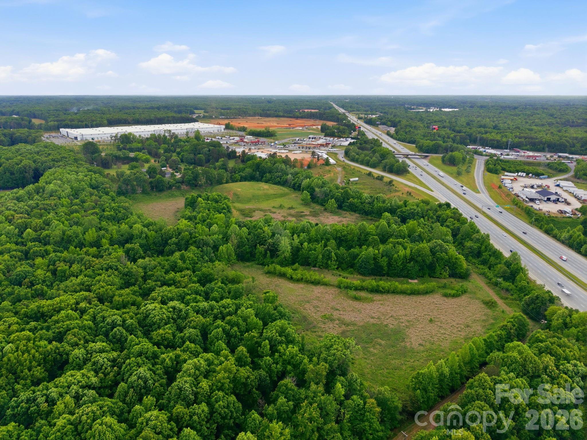 1140 Peeler Road Salisbury, NC 28146 - Photo 5 of 15 a view of a city with a lake