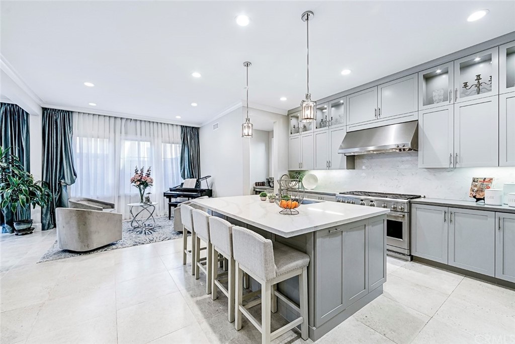 65 Rockinghorse Irvine, CA 92602 - Photo 8 of 43 a kitchen with a stove and a view of living room