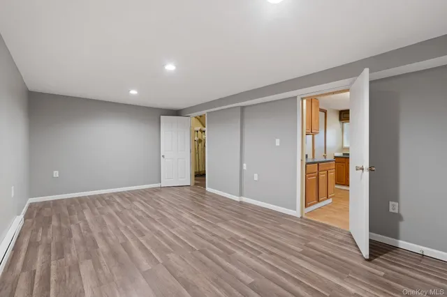 a view of livingroom with wooden floor
