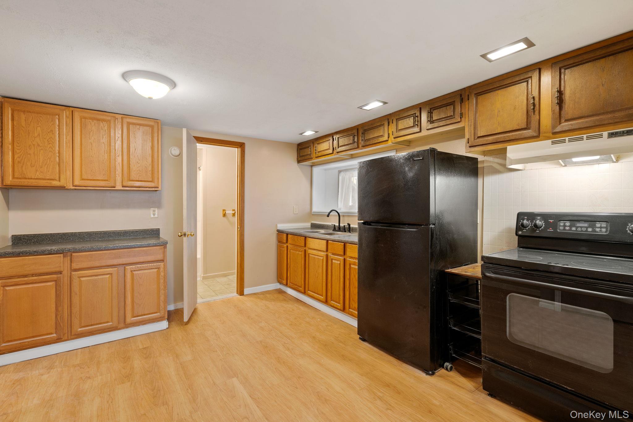 7 Red Top Road, Unit 2 Wallkill, NY 12589 - Photo 7 of 24 a kitchen with stainless steel appliances granite countertop a refrigerator a stove and a sink