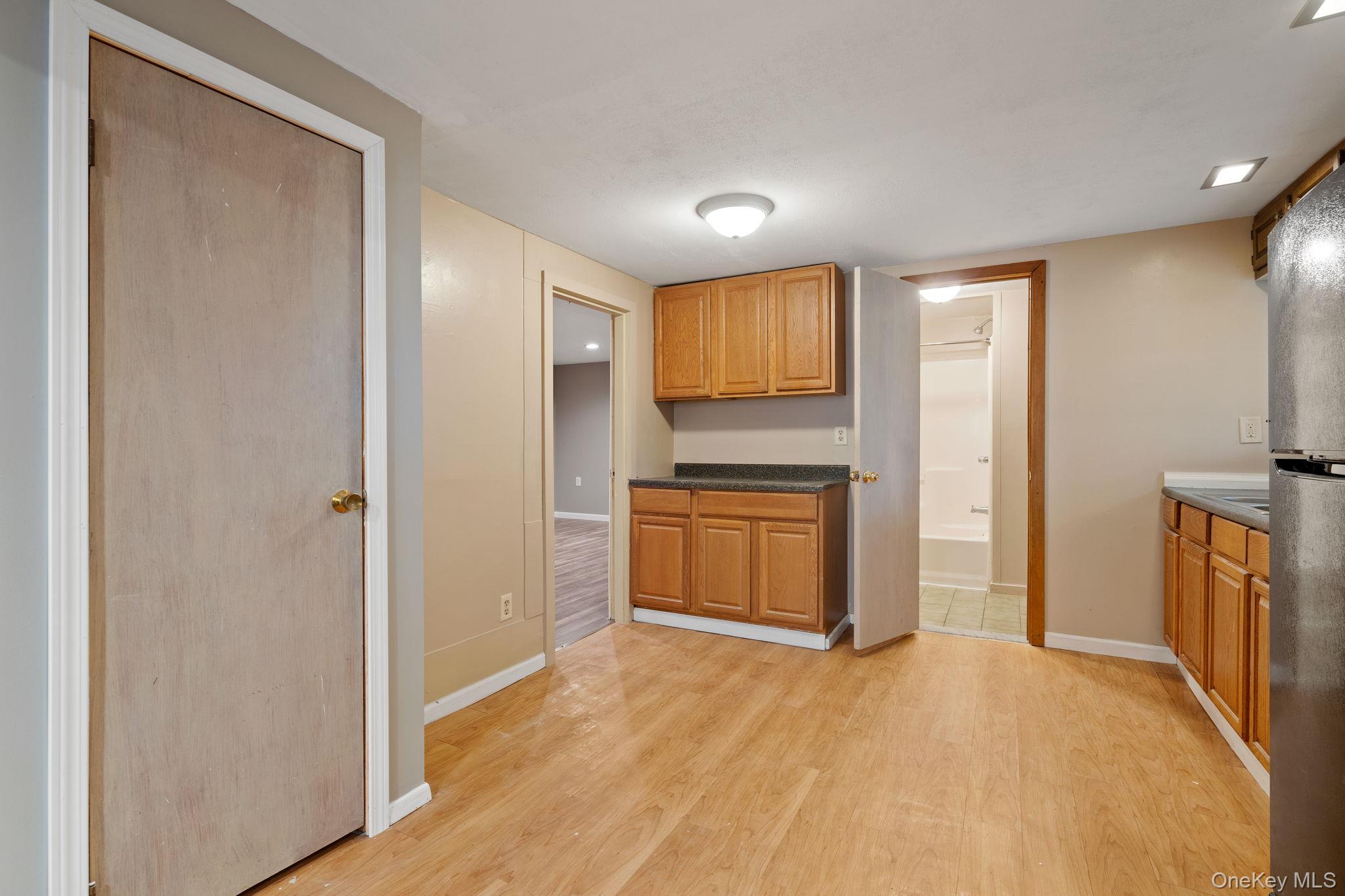 7 Red Top Road, Unit 2 Wallkill, NY 12589 - Photo 9 of 24 a view of a kitchen with a sink and a refrigerator