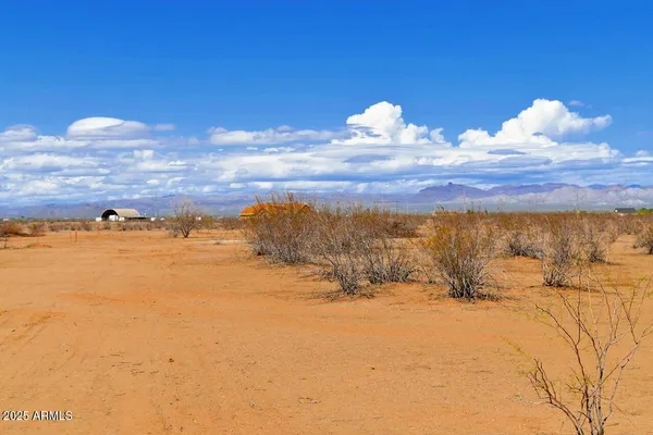 a view of a lake with a mountain in the background