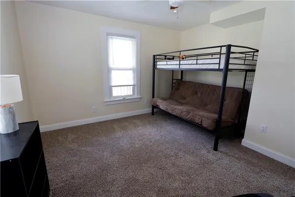 a bedroom with bunk bed