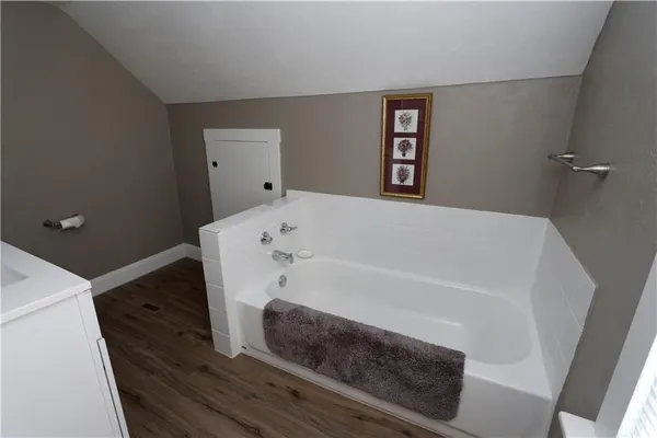 a bathroom with a bathtub