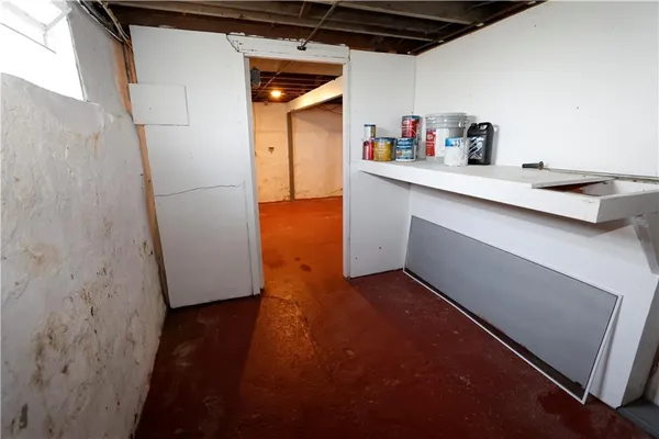a view of storage and utility room with washer and dryer