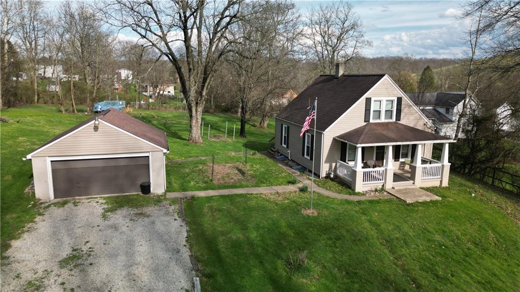 110 Blanche Road Fredericktown, PA 15333 - Photo 8 of 39 a front view of a house with garden