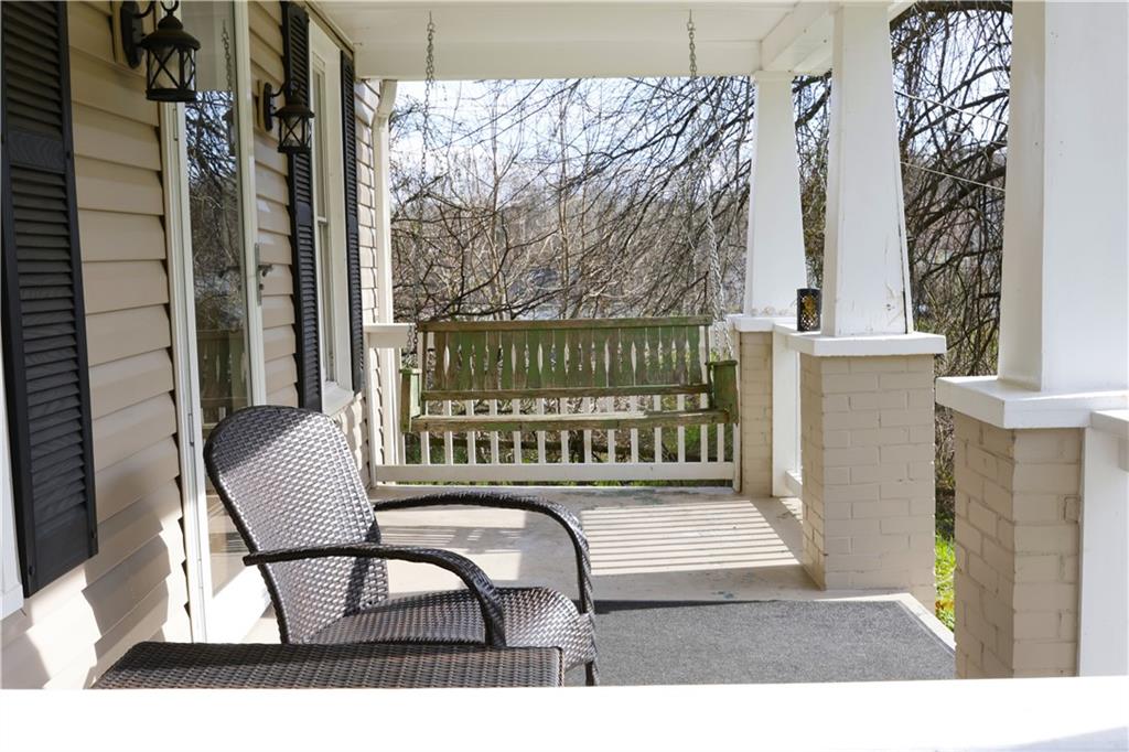 110 Blanche Road Fredericktown, PA 15333 - Photo 10 of 39 a balcony with a bench and a porch