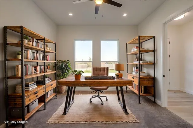a view of a workspace with furniture