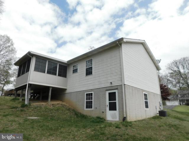 5013 Decatur Street St. Leonard, MD 20685 - Photo 4 of 45 a house view with a garden space