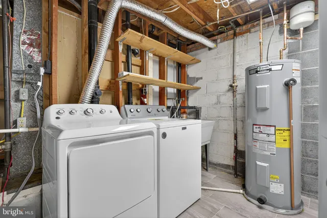 a view of a hallway with white walls