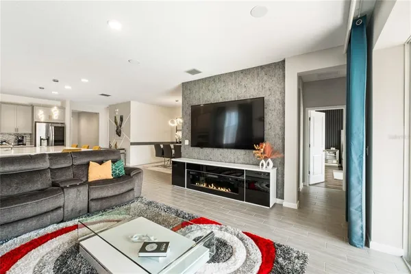 a bathroom with a sink a mirror and a shower