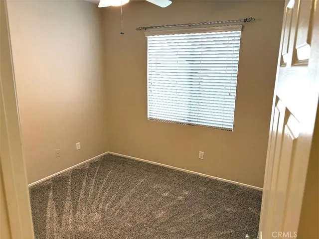 a view of a room with a window