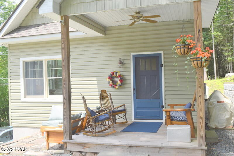 549 Finn Swamp Road Lakeville, PA 18438 - Photo 24 of 35 a house with wooden door