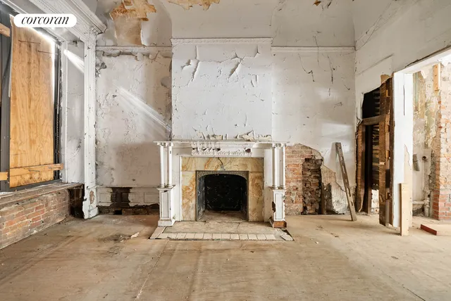 a view of a hallway with staircase