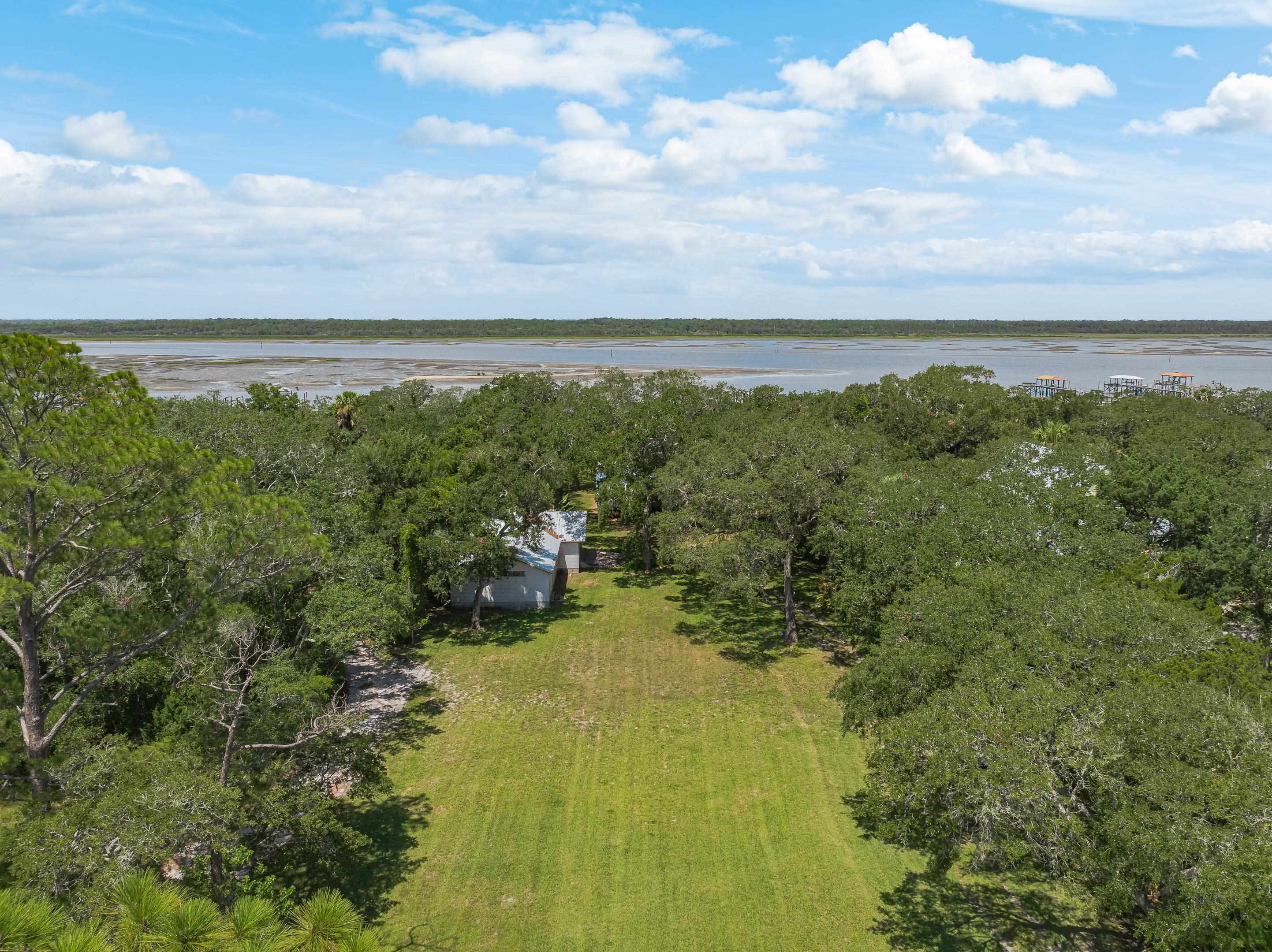 5425 A Windantide Road St. Augustine, FL 32080 - Photo 2 of 10 a view of lake with mountain