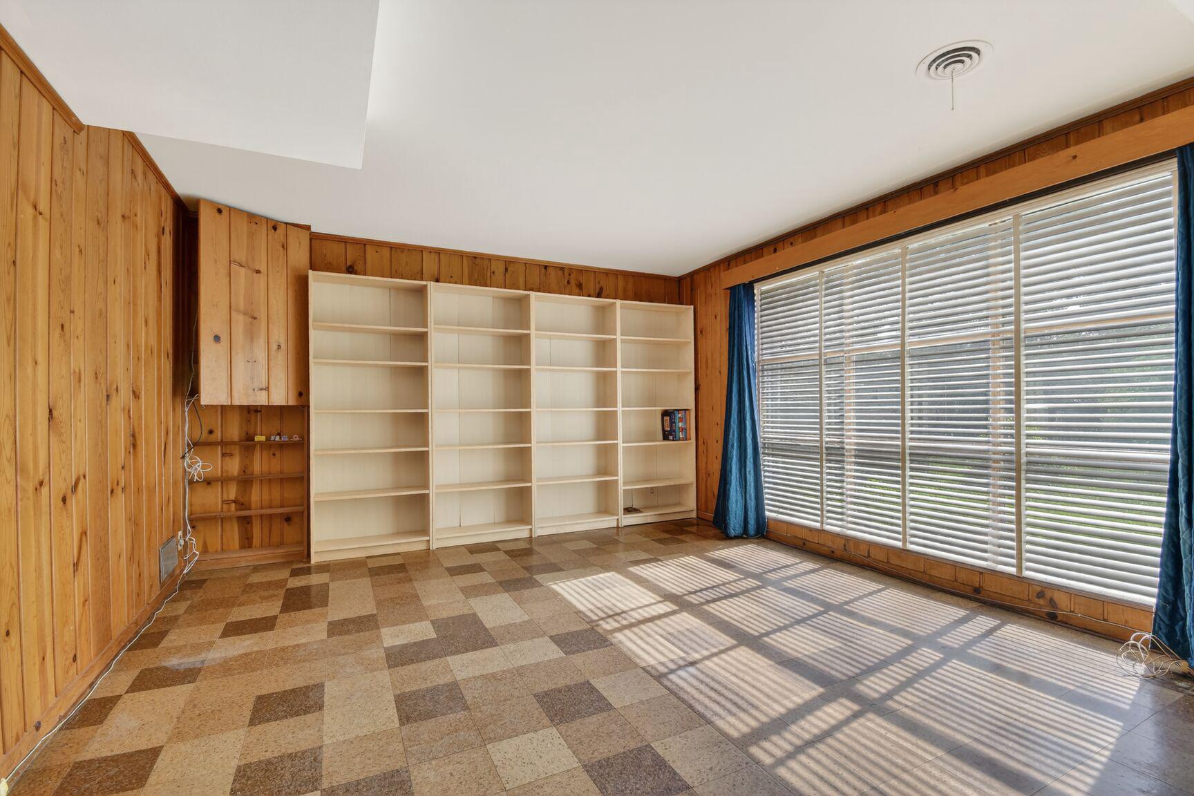 10226 Leslie Street Silver Spring, MD 20910 - Photo 19 of 32 a view of a room with a door and wooden floor