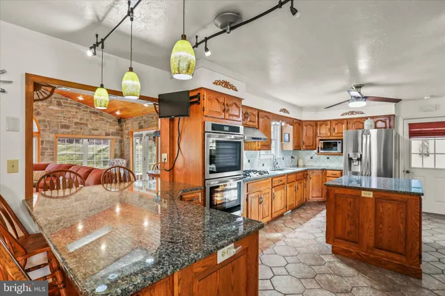 a bedroom with bed and window