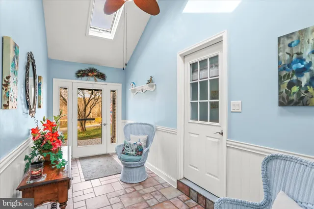 a picture of a bench in a white building