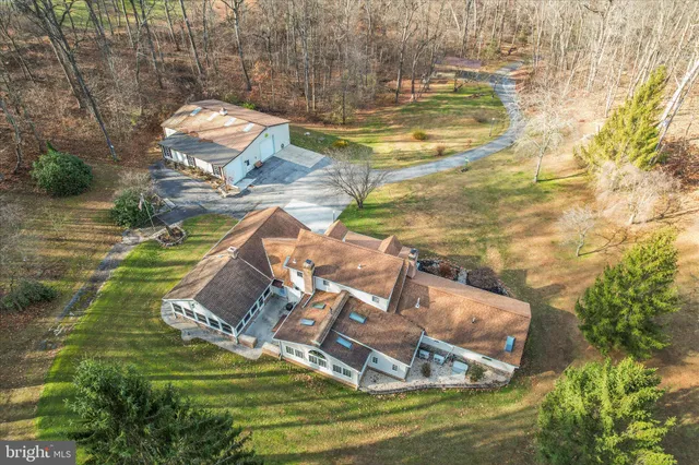 a view of a patio with wooden floor and fence