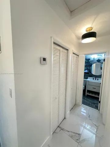 a view of a livingroom with a bathroom