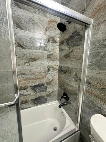 a bathroom with a bathtub