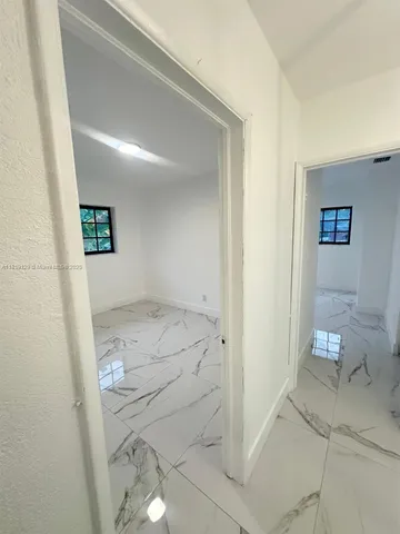 an empty room with a natural light