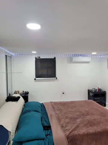 a kitchen with a sink a stove and cabinets