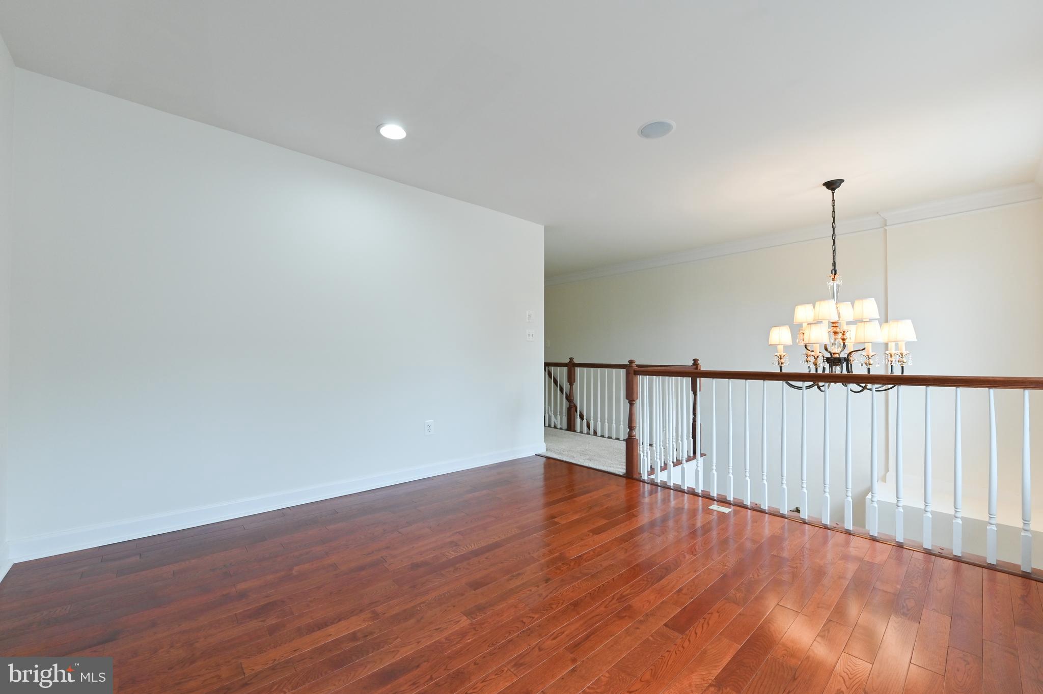 1901 Eamons Way Annapolis, MD 21401 - Photo 22 of 64 a view of empty room with wooden floor