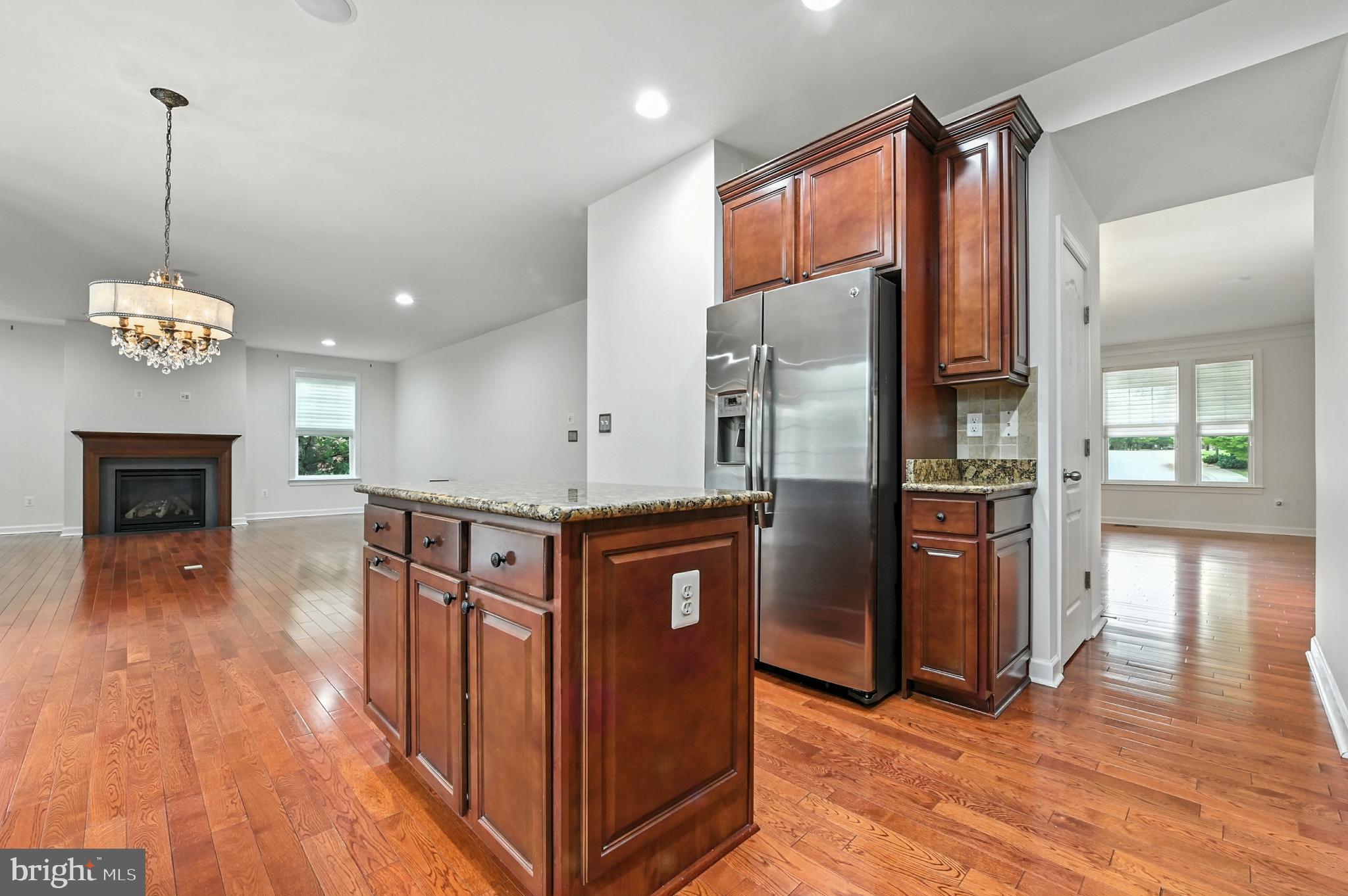 1901 Eamons Way Annapolis, MD 21401 - Photo 26 of 64 a kitchen with stainless steel appliances granite countertop a refrigerator a stove and a wooden floors
