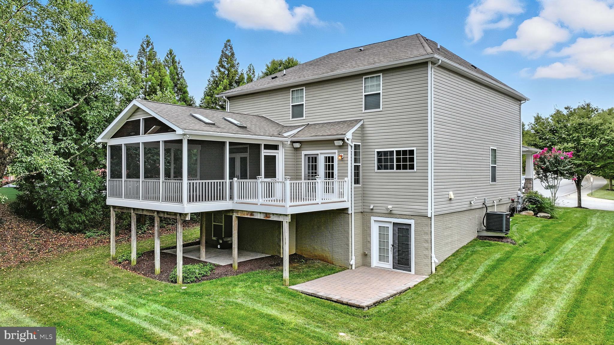 1901 Eamons Way Annapolis, MD 21401 - Photo 3 of 64 a front view of a house with a garden