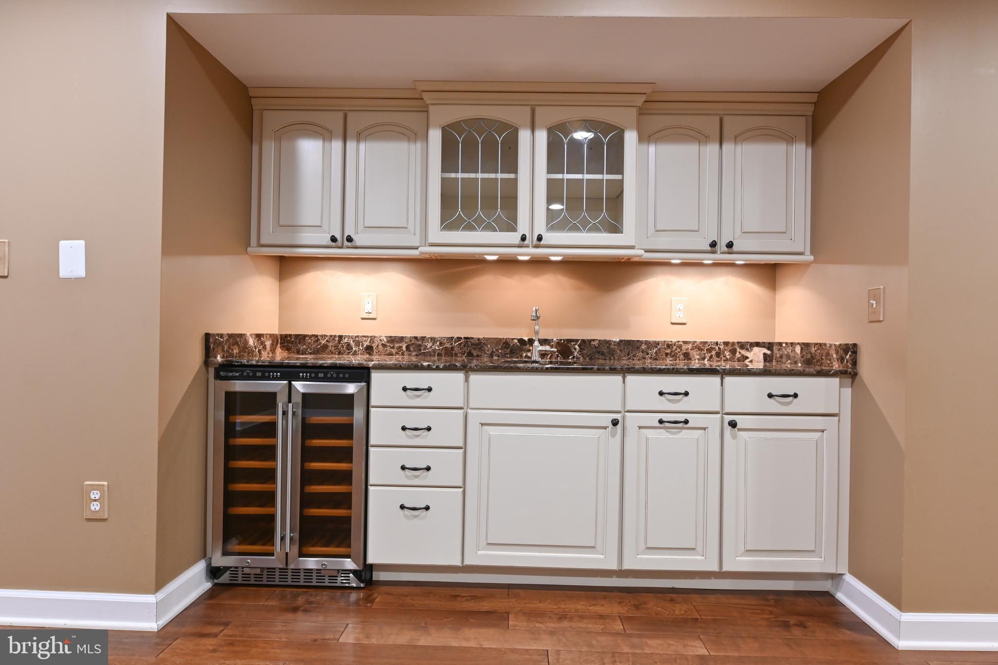 1901 Eamons Way Annapolis, MD 21401 - Photo 32 of 64 a kitchen with granite countertop a white cabinets and sink