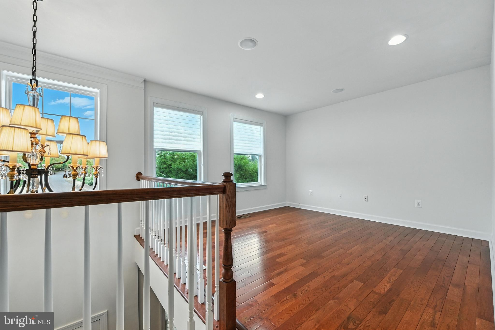 1901 Eamons Way Annapolis, MD 21401 - Photo 34 of 64 a view of a hallway with wooden floor and windows