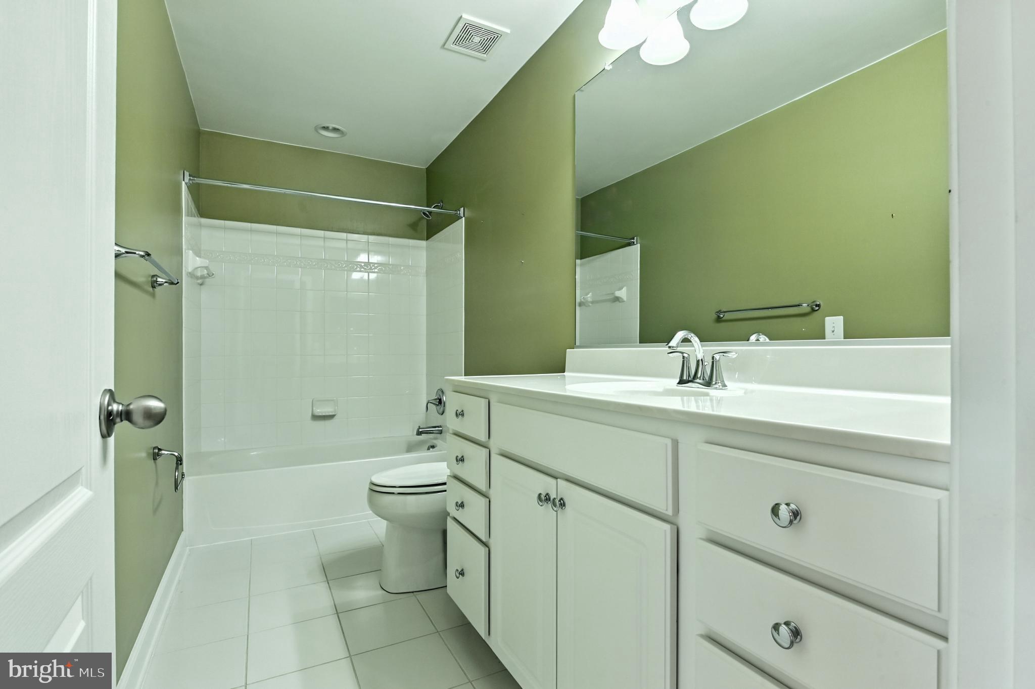 1901 Eamons Way Annapolis, MD 21401 - Photo 36 of 64 a bathroom with a double vanity sink mirror and toilet