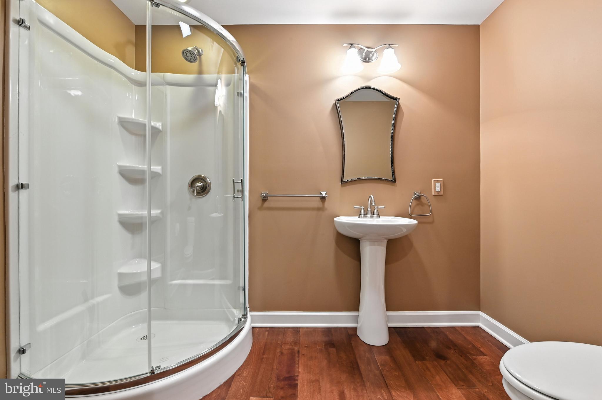 1901 Eamons Way Annapolis, MD 21401 - Photo 50 of 64 a bathroom with a sink and a mirror