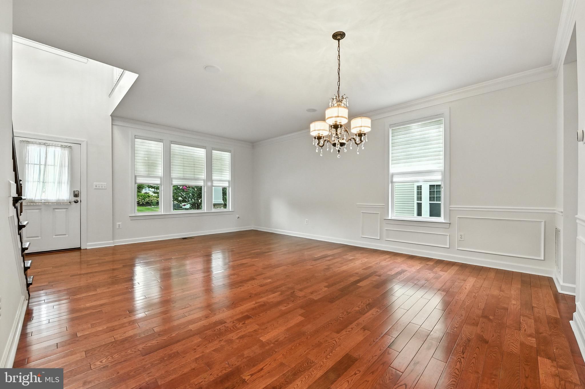 1901 Eamons Way Annapolis, MD 21401 - Photo 54 of 64 a view of an empty room with wooden floor and a window