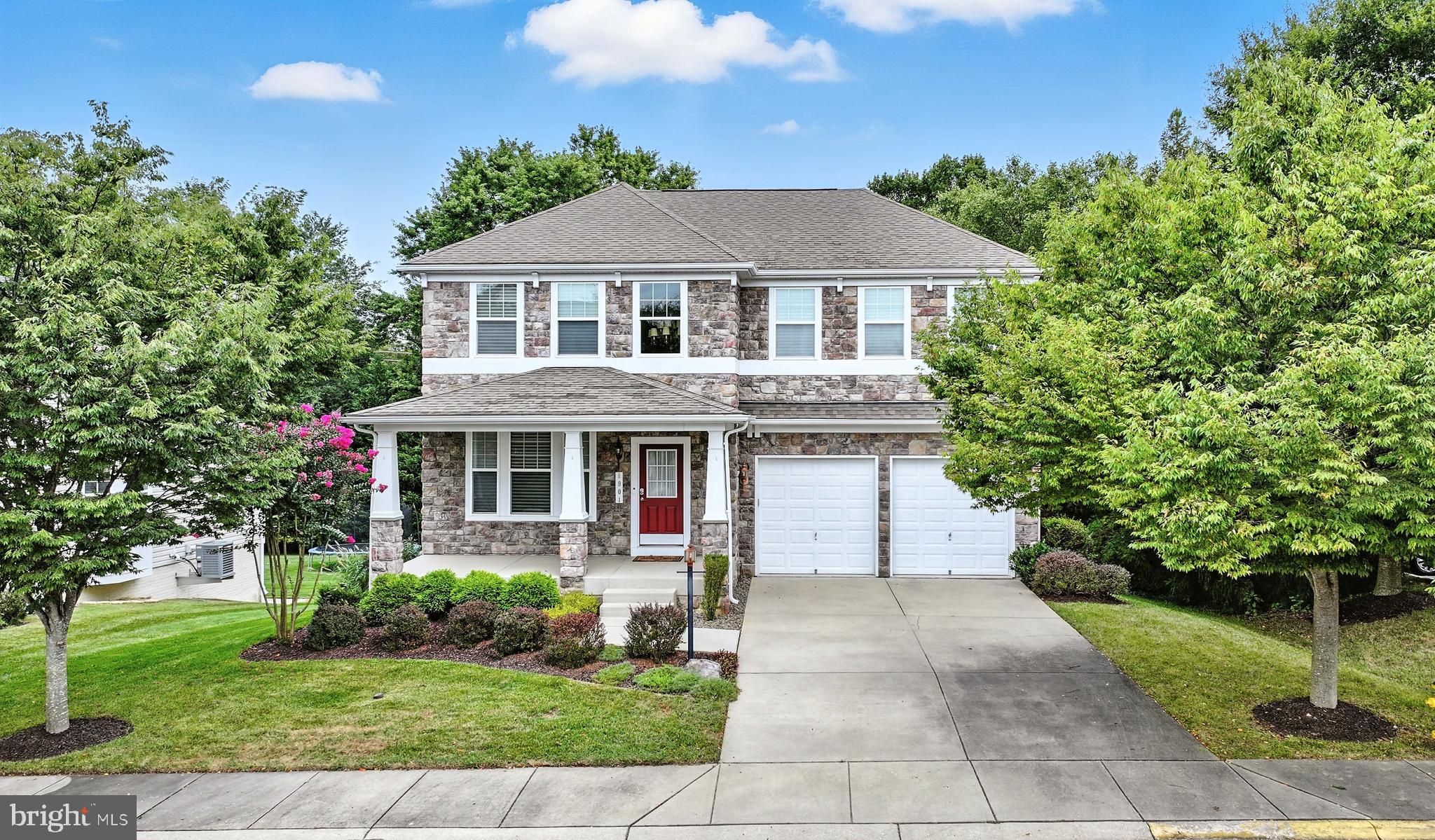 1901 Eamons Way Annapolis, MD 21401 - Photo 58 of 64 a front view of a house with a garden