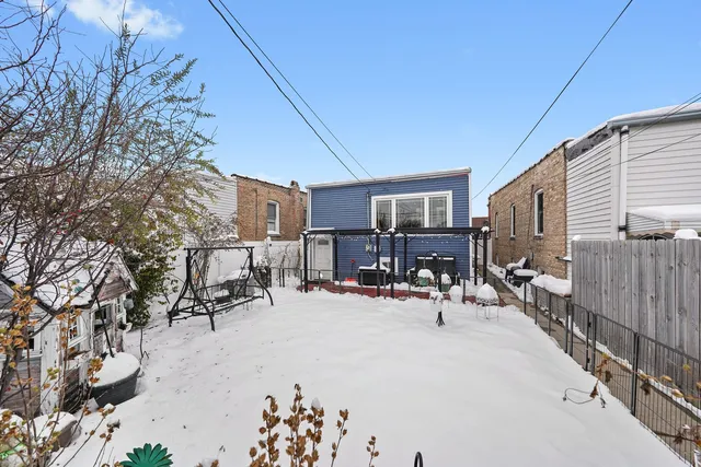 a view of a backyard with a patio