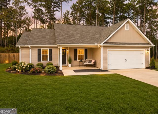 31 Rolling Woods Lane Colbert, GA 30628 - Photo 1 of 30 a front view of house with yard and green space