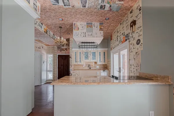 a view of a fireplace with a hallway